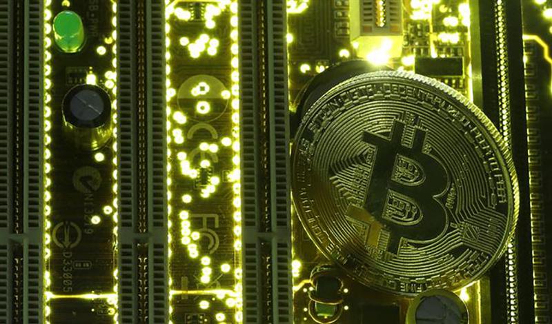 Le Bitcoin flambe vers les 60 000$ dans l'espoir d'un ETF américain